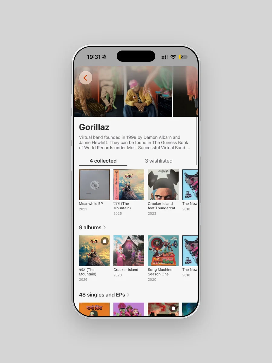 Gorillaz's artist page on iPhone: the band photo and biography, 4 collected and 3 wishlisted, then 9 albums.