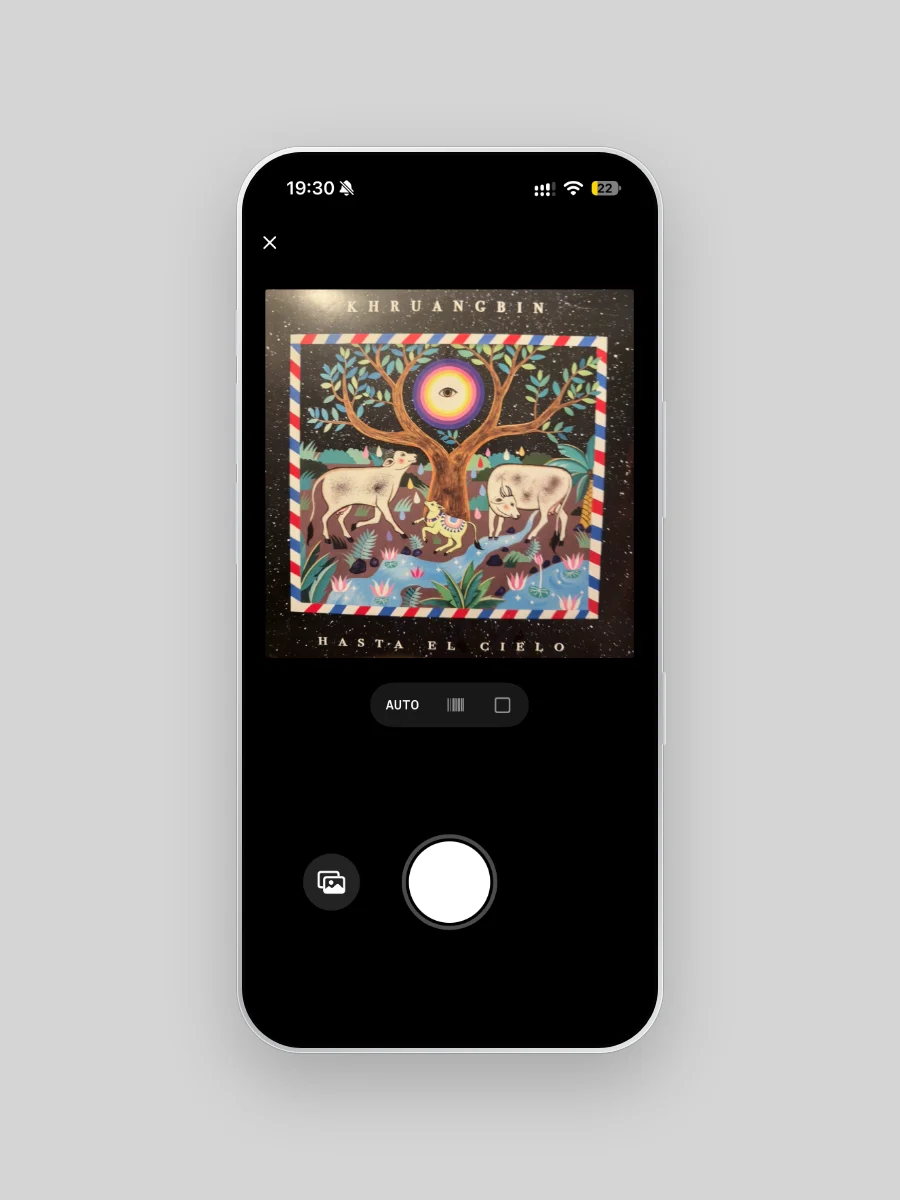 Plastic's scanner on iPhone with Auto selected and the cover of Khruangbin's Hasta El Cielo in the viewfinder.